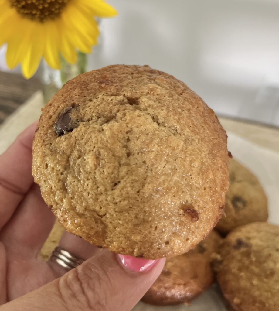 hand holding a single from scratch banana muffin
